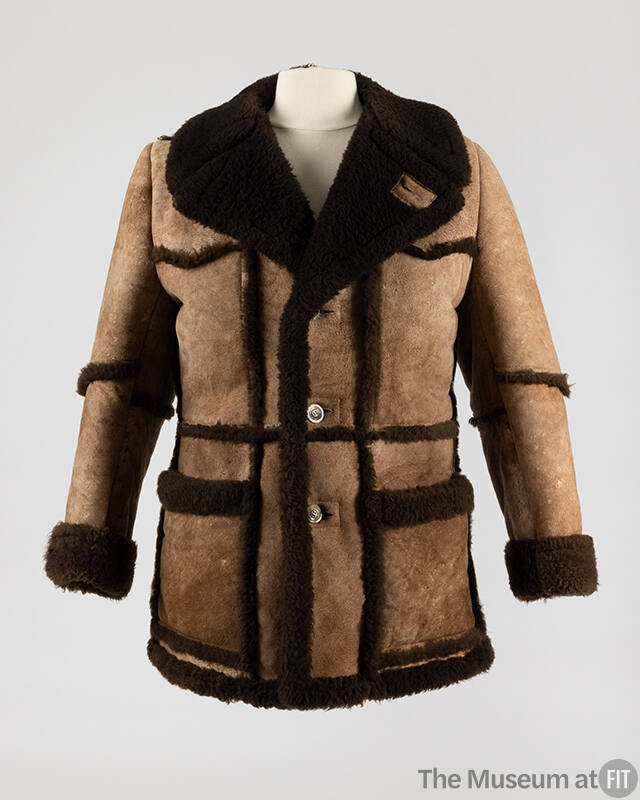 Brown 3/4 length button front  jacket with shearling lapels, cuffs and trim, patch pockets