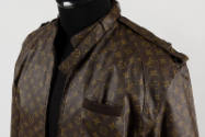 Detail of brown Louis Vuitton monogram fabric jacket with shoulder epaulet