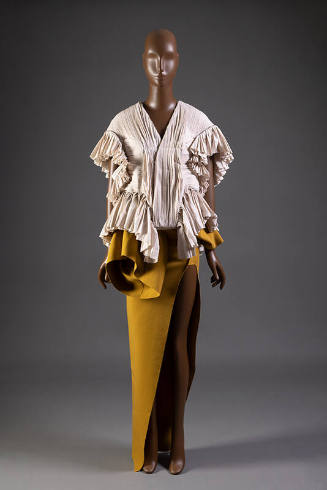 Off-white pleated ruffled short sleeve jacket and floor-length dark yellow dress with thigh-hig…