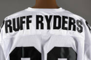 Back shoulder detail of Ruff Ryders logo on white sports jersey