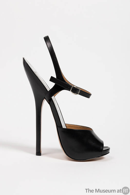 Black open toe sandal with extremely high stiletto heel and ankle strap