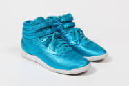 Pair of metallic blue hightop sneakers with double velcro strap ankle closure, white sole and R…