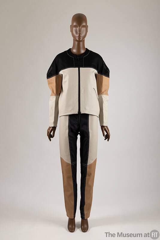 Black, off-white and tan colorblocked matching set of collarless long sleeve zip front jacket a…