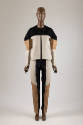 Black, off-white and tan colorblocked matching set of collarless long sleeve zip front jacket a…