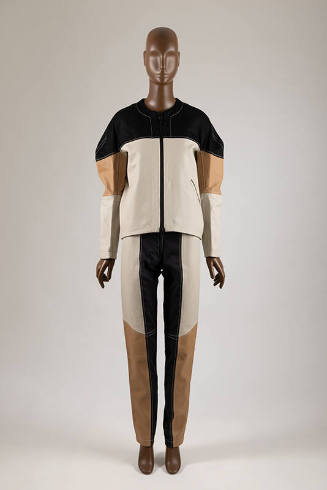 Black, off-white and tan colorblocked matching set of collarless long sleeve zip front jacket a…