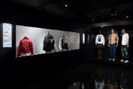 Hip Hop Style exhibition installation view of three jackets in a case and three dressed mannequ…
