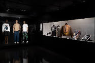 Hip Hop Style exhibition installation view of three dressed mannequins on a platform and sneake…