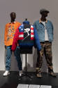 Hip Hop Style exhibition installation view of three mannequins in Ralph Lauren menswear ensembl…
