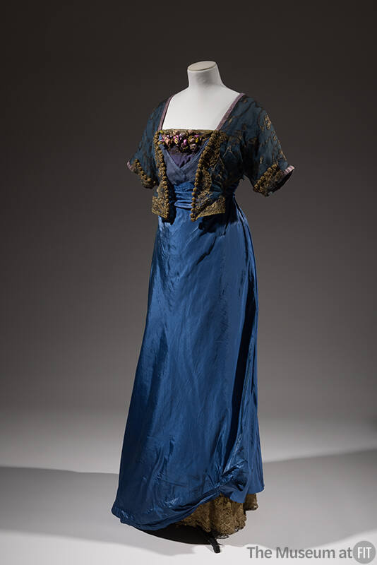 Long blue gown: sheer bodice with gold thread embroidered design, short kimono sleeve, mock bol…