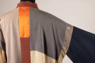 Back and sleeve detail of blue, orange, grey and beige silk kimono