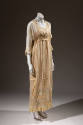 Off-white sheer nightgown with satin trim, lace and bows, flower at bodice