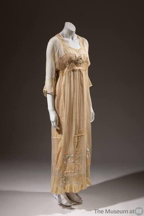 Off-white sheer nightgown with satin trim, lace and bows, flower at bodice