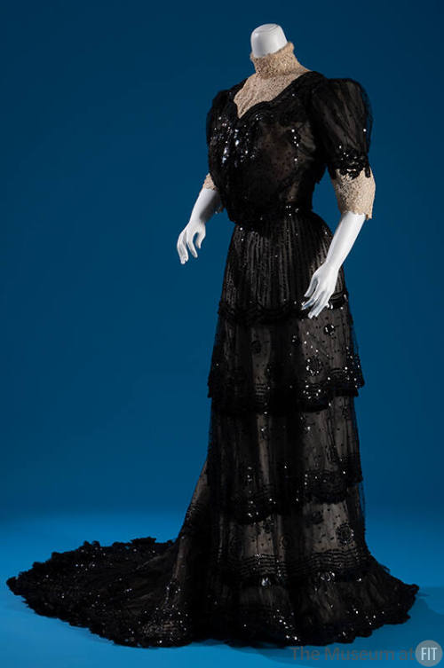 Black sheer lace dress with beads and sequins, high beige lace neck and elbow length sleeve cuf…