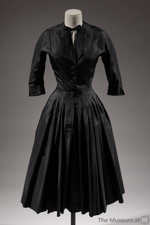 Black silk 3/4 sleeve dress with button front bodice with neck tie, knee-length full gathered s…