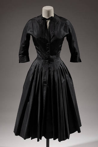 Black silk 3/4 sleeve dress with button front bodice with neck tie, knee-length full gathered s…