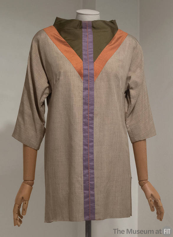 Brown heathered tunic with purple and pink stripe down the middle and orange V at bust