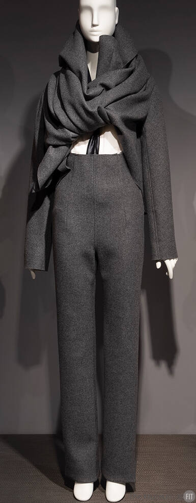 Grey wool long sleeve wrap jacket with high collar and matching high waist pants