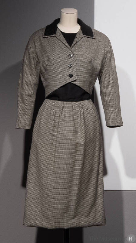 3/4 sleeve, knee length gray dress with buttons and black collar detail