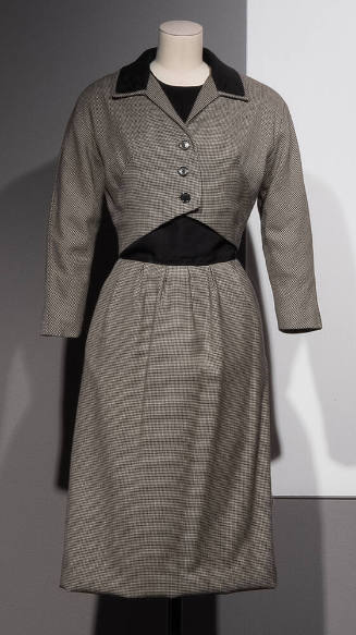 3/4 sleeve, knee length gray dress with buttons and black collar detail