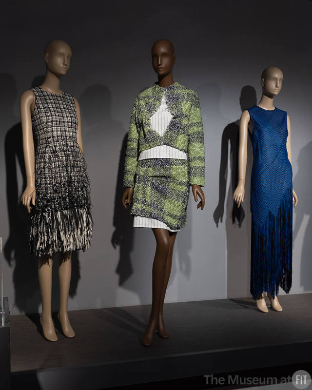 Left to right: Designs by Oscar de la Renta (2017.67.1), Mexican fashion brand PTRA (2022.37.3), and Proenza Schouler (2022.42.2) featured in the section on “Elegance” in ¡Moda Hoy! Latin American and Latinx Fashion Design Today.