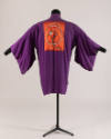 Alternate back view of purple kimono with red back patch with pink, white and green braid desig…