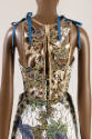 Back view of dress in printed coat and dress ensemble showing gold embroidered bodice bib with …