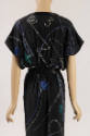 Back detail of black silk dress with blue, green, and copper Art Deco bugle beading, cap sleeve…