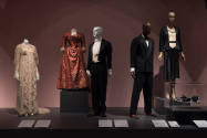 Food & Fashion exhibition installation view of five dressed mannequins and a case with two hats