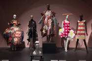 Food & Fashion exhibition installation view of five mannequins in food and produce themed ensem…