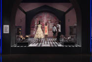Food & Fashion exhibition installation view of six dressed mannequins and two cases of accessor…