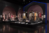 Food & Fashion exhibition installation view of the gallery with dressed mannequins and cases of…