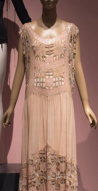 Pink sleeveless evening dress with sequin and crystal bead embroidery and cut out floral patter…