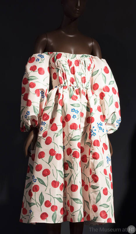 White with red and green cherry and blue flower print off-the-shoulder dress, ¾ puff sleeves an…