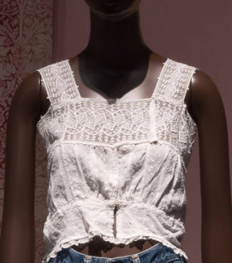 White embroidered camisole top with lace band shoulder straps and upper bodice, cropped length …