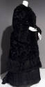 Black broche dolman coat trimmed with black marabou feathers on stand collar, center front and …