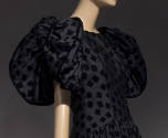 Detail of black taffeta gown with cut velvet squares large puffed sleeves