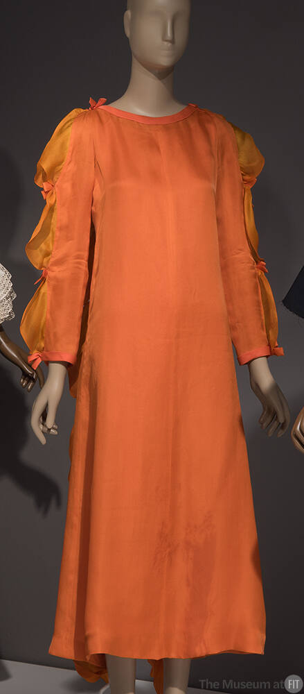 Orange evening set: dress, slip, and long sleeve floor length dress with ruffles and bows at ou…