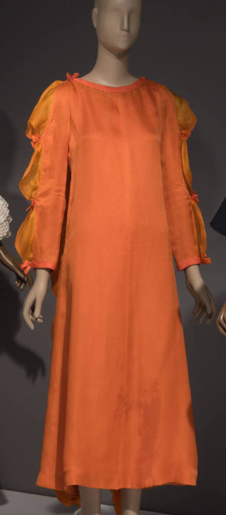 Orange evening set: dress, slip, and long sleeve floor length dress with ruffles and bows at ou…