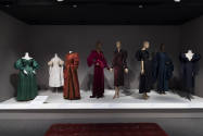 Statement Sleeves exhibition installation view of eight dressed mannequins in the Opening State…
