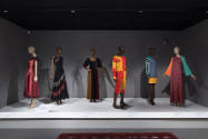 Statement Sleeves exhibition installation view of six dressed mannequins in the Asymmetrical & …