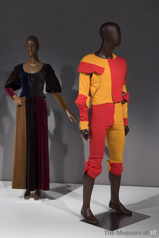 Dress by Yves Saint Laurent Rive Gauche, 1970 (left, 76.201.2); man's ensemble by Vivienne Westwood, spring 1989 (right, P89.60.2)