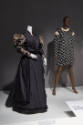 Statement Sleeves exhibition installation view of two mannequins in historical and modern black…