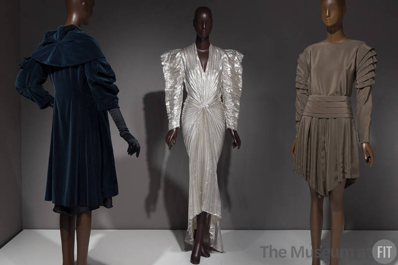 From left to right: coat by Mae & Hattie Green, c.1929 (95.145.18); dress by Thierry Mugler, fall 1979 (2004.49.4); set by Giorgio Armani, 1982 (90.99.1)