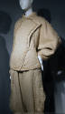 Tan jacket with asymmetrical front panel, two button closing and matching knickers, self fringe…