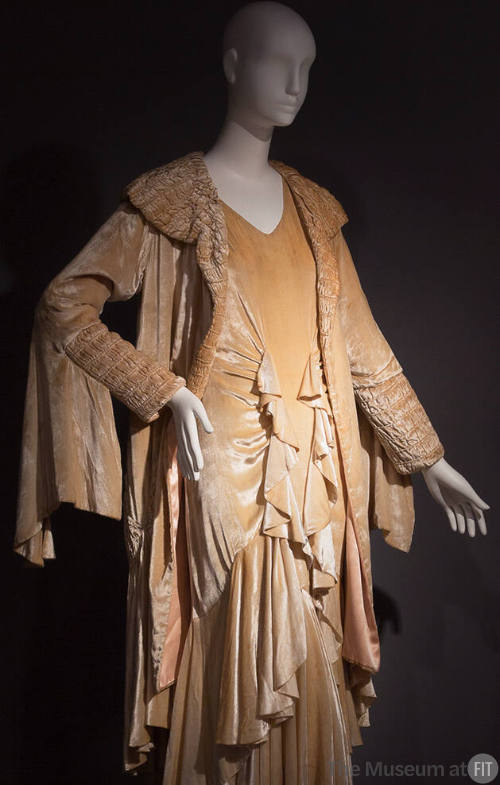 Golden yellow evening dress, coat, and detached sleeves with front ruffles