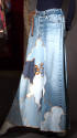 Blue denim maxi skirt with denim cloud appliques sewn with gold stitching dressed with brown su…