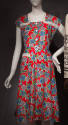 Red sleeveless dress with blue and green floral and black and white check print, white lace tri…