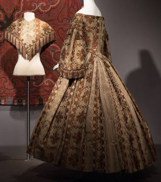 Olive green and brown brocade dress in floral/snowflake pattern with wide floor length skirt, ¾…