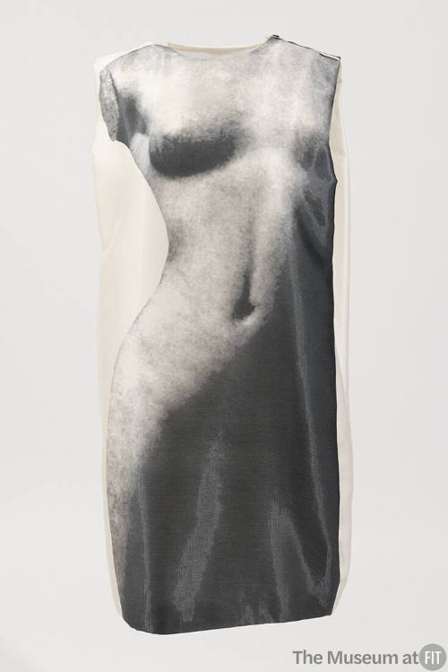 Off-white sleeveless mini dress with full length print of grey, nude, armless statue