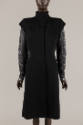Knee length black coat with cap sleeves and long silver lace sleeves underneath